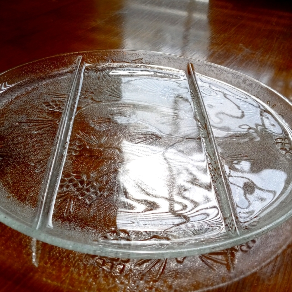 This is a lead crystal serving platter divided into 3 parts